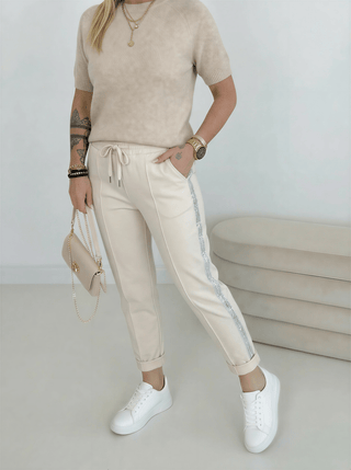 Beige Stretchhose, mit Pailletten Streifen an der seite der Beine lang
